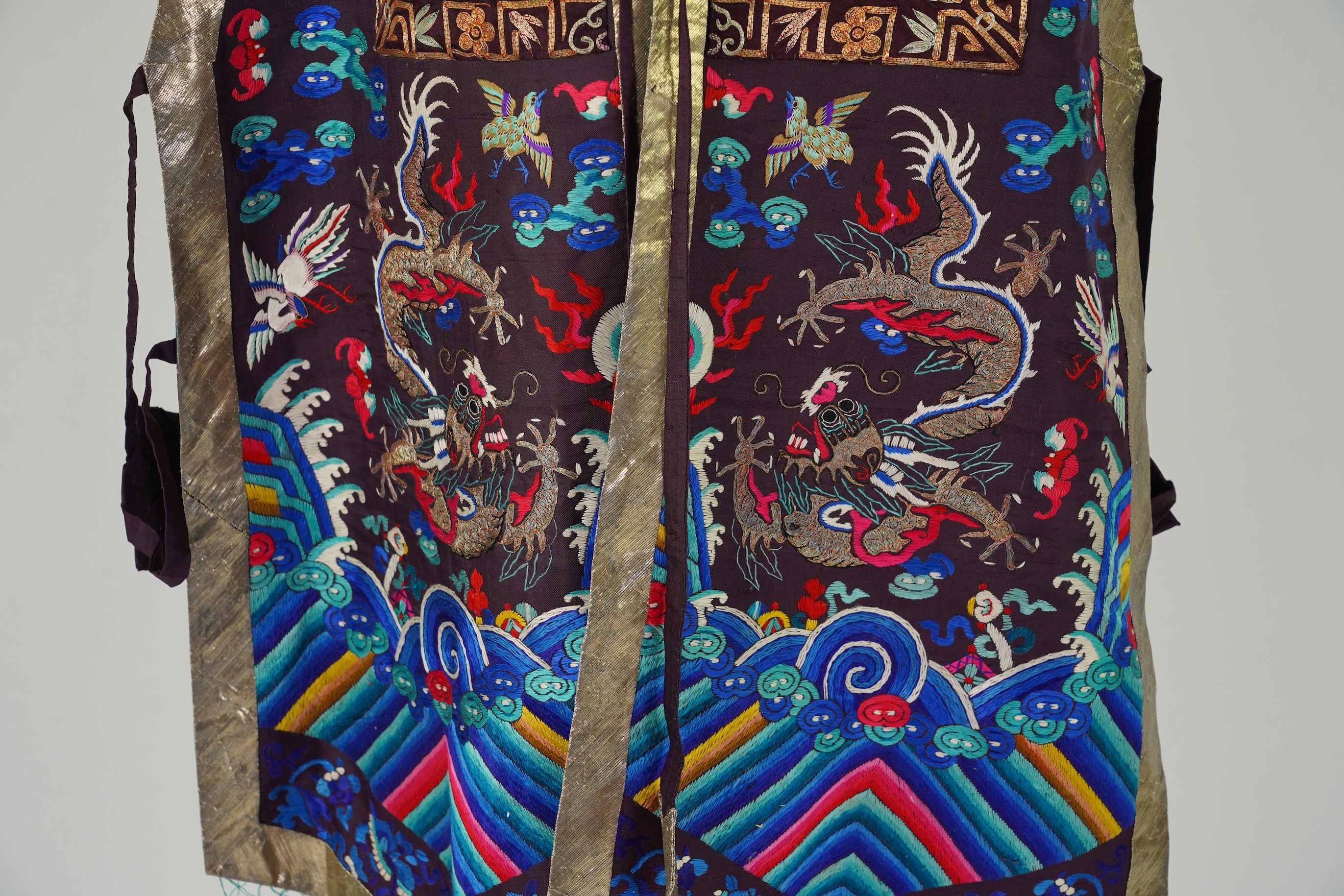 A Chinese embroidered silk vest, xiapei, early 20th century